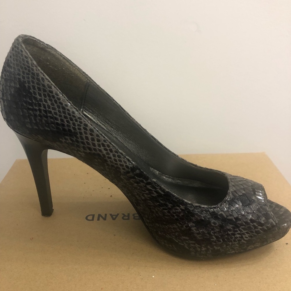 Peep toe snake skin heels